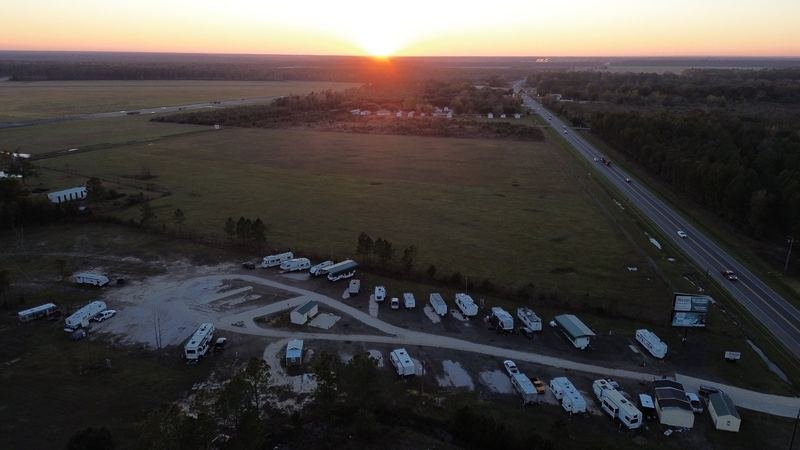 Aerial view of Happy Days RV Park at sunset
